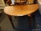 (R3) SOFA TABLE; WOODEN HALF CIRCLE SOFA TABLE WITH 4 BLOCK LEGS. MEASURES 4 FT X 25 IN X 29.5 IN.