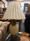 (R3) TABLE LAMP; BEIGE POTTERY ART TABLE LAMP WITH A GLAZED FINISH, PUMPKIN SHAPE AND A CHUTED LAMP