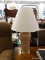 (R3) TABLE LAMP; PINK TABLE LAMP WITH A BRASS STAND AND TOP WITH A WHITE COOLIE LAMP SHADE. MEASURES