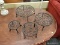 (R3) ELEVATED TRIVETS; 4 PIECE LOT OF MATCHING, ELEVATED, ORNATE TRIVETS OF VARYING HEIGHTS AND