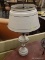 (R3) TABLE LAMP; CREAM AND BLACK SPECKLED METAL TABLE LAMP WITH 3 FAUX CANDLE FIXTURES. MEASURES 23