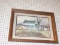 (WALL) FRAMED PRINT; DEPICTS A COUNTRY HOME MATTED IN BROWN AND LINEN. SIGNED BY ARTIST IN BOTTOM