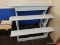 (BWALL) WOODEN DISPLAY SHELF; LIGHT BLUE PAINTED 3 TIERED WOODEN DISPLAY SHELF. MEASURES 4 FT X 2 FT
