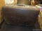 (TABLE) VINTAGE AMERICAN TOURISTER SUITCASE; LARGE DARK BROWN HARD-SHELL SUITCASE WITH FRONT MEAL