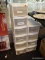 (TABLE) LOT OF PLASTIC BINS; 10 PIECE LOT OF WHITE PLASTIC BINS AND CONTENTS TO INCLUDE ENVELOPES,