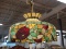 STAINED GLASS CHANDELIER; ORANGE, GREEN, AND RED FLORAL PATTERN CHANDELIER IN EXCELLENT CONDITION.