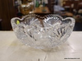 (R2) GLASS BOWL; LARGE CRYSTAL GLASS BOWL WITH SCALLOPED AND TOOTH EDGES AND ASTRAL DETAILING.