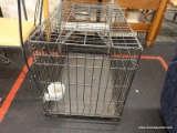 (R3) ANIMAL CAGE; METAL ANIMAL CANE WITH A PLASTIC BED AND A FRONT AND SIDE DOOR. MEASURES 30 IN X