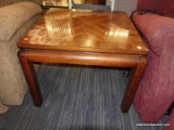 (R3) WOODEN END TABLE; WOODEN END TABLE WITH A PANELED WOOD DETAILING THAT HAS THE WOOD GRAINS