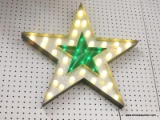 (WALL) LIGHT UP STAR; WALL HANGING STAR WITH AN INNER STAR THAT LIGHTS UP GREEN AND AN OUTER STAR