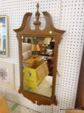 (WALL) WALL HANGING MIRROR; WOODEN MIRROR WITH A BROKEN ARCH PEDIMENT TOP. MEASURES 20 IN X 39.5 IN.