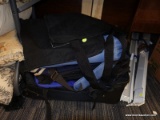 (WALL) LOT OF LUGGAGE; APPROXIMATELY 5 PIECES TOTAL. INCLUDES A ROLLING SUITCASE, CARRY ON BAGS, AND