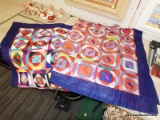 (BWALL) PAIR OF QUILTS; PAIR OF VIBRANTLY AND MULTI-COLORED QUILTS WITH MATCHING PATTERN.