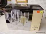 (BWALL) LNT HOME GLASS FLUTES; SET OF 12 GLASS 5 3/4 OZ CHAMPAGNE FLUTES. IN THE ORIGINAL BOX! MADE