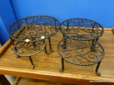 (BWALL) ELEVATED TRIVETS; 4 PIECE LOT OF MATCHING, ELEVATED, ORNATE TRIVETS OF VARYING HEIGHTS AND