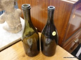 (R1) WINE BOTTLES; PAIR OF EMPTY WINE BOTTLES. MEASURES 11 IN TALL.