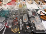 (TABLE) LOT OF ASSORTED GLASSWARE; LOT INCLUDES 6 VASES, GLASS ASHTRAYS, 4 BALL DRINKING MASONS,