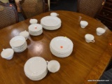 (R2) LOT OF WEDGWOOD CHINA; 45 PIECE LOT OF WEDGWOOD CREAM COLOR ON CREAM COLOR WITH A SHELL EDGE