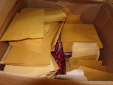 (TABLE) BOX FULL OF ENVELOPES; BOX HAS AN ESTIMATED 1000 ENVELOPES IF NOT MORE.