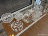 (TABLE) GLASS LOT; 11 PIECE LOT OF ASSORTED GLASSWARE TO INCLUDE DECORATIVE BOWLS, CANDELABRAS, AND