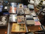 (TABLE) LOT OF DVDS; ~30 PIECE LOT OF ASSORTED DVDS TO INCLUDE HISTORY CHANNEL AMERICAN WAR DVDS,
