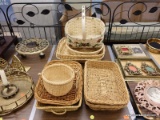 (TABLE) LOT OF WOODEN BASKETS; 9 PIECE LOT OF ASSORTED WOVEN BASKETS OF DIFFERENT SHAPED AND SIZES.