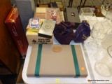 (TABLE) POKER CHIP AND PLAYING CARDS LOT; LOT INCLUDE 2 BAGS FULL OF POKER CHIPS, AN EDDIE BAUER