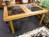 (R2) PATIO TABLE; BLACK GLASS PANELED WOODEN PATIO TABLE WITH BRASS CAPPED CORNERS AROUND THE 4