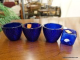 (R2) GLASS VOTIVES; 3 PIECE LOT OF BLUE GLASS VOTIVES WITH HOBNAIL DETAILING. LOT ALSO INCLUDE A