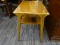 (R2) MID-CENTURY MODERN TABLE; WOODEN END TABLE WITH A LOWER SHELF AND ROUNDED/SQUARISH LEGS.