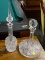 (R3) DECANTERS; PAIR OF GLASS DECANTERS WITH ASTRAL DESIGNS AND STOPPERS, ONE IS LARGE AT THE BOTTOM