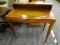 (R3) END TABLE; WOODEN END TABLE WITH A BROWN TONED, OVAL INLAY ON THE TABLE TOP THAT HAS GOLD TONE