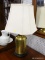 (R1) TABLE LAMP; BRASS TABLE LAMP ON A WOODEN STAND WITH FLOWERS AND BIRDS ETCHED INTO THE LAMP.