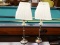 (R3) PAIR OF TABLE LAMPS; SILVER TONED LAMPS WITH SQUARE PLEATED CLOTH SHADES. BOTH ARE IN VERY GOOD