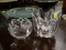 (R3) PAIR OF CANDLE VOTIVE HOLDERS; 1 IS MADE BY ORREFORS CRYSTAL AND 1 IS IN THE FORM OF A BLOOMING