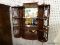 (R1) WALL SHELF; WOODEN WALL HANGING SHELVING UNIT WITH 4 SHELVES, A SHELL CARVED GALLERY