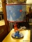(R3) CHILDS TABLE LAMP; ORIGINALLY FROM BABIES R US. IS BLUE, ORANGE, AND RED IN COLOR WITH A BLUE