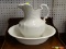 (R1) PITCHER WITH BASIN; HOMER LAUGHLIN, WHITE WASH BASIN WITH SHELL DETAILED PITCHER. BASIN HAS A