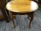 (R4) ROUND END TABLE; SINGLE DRAWER END TABLE WITH SHELL CARVING AND QUEEN ANNE FEET. IS IN GOOD