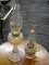 (R4) 2 PIECE LOT; INCLUDES A SINGLE HANDLED OIL LAMP WITH CHIMNEY AND AN OIL LAMP WITH CHIMNEY AND