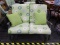 (R4) GLIDING BENCH; GREEN METAL BENCH WITH GREEN FLORAL UPHOLSTERED CUSHIONS AND 2 ACCENT PILLOWS.