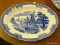 (R4) BLUE AND WHITE SERVING PLATTER; DEPICTS A DUTCH VILLAGE SCENE WITH BOATS IN THE BACKGROUND. IS