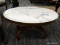(R4) VICTORIAN COFFEE TABLE TABLE; HAS A WHITE MARBLE TOP WITH WALNUT BASE. IS IN EXCELLENT