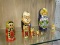 (R1) MATRYOSHKA DOLLS; 4 PIECE LOT OF RUSSIAN NESTING DOLLS TO INCLUDE A MAN IN SUIT, AN ANGEL WITH
