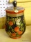 (R1) LIDDED JAR; WOODEN, RUSSIAN, HAND PAINTED COOKIE JAR WITH APPLES AND GOLD TONE LEAVES ON THE