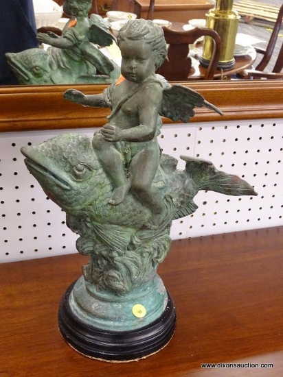 (R1) VINTAGE STONE STATUE; ANGEL BABY RIDING A FISH OUT OF WATER. SITS ON A WOODEN STAND. MEASURES