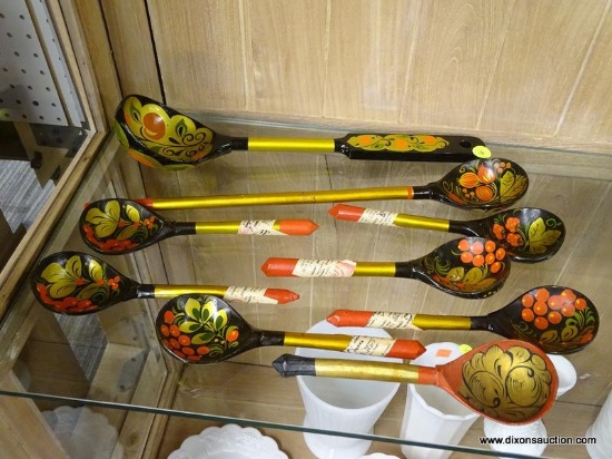 (R1) WOODEN SPOONS; 9 WOODEN, HAND CRAFTED AND PAINTED, RUSSIAN SPOONS WITH A RED, BLACK, AND GOLD