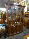(R2) CHINA CABINET; 2 PC WOODEN CHINA CABINET. THE TOP PIECE HAS DENTAL MOLDING ALONG THE TOP AND 4
