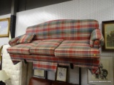 (R2) CAMELBACK SOFA; HIGH POINT FURNITURE 3 CUSHION SOFA WITH A FADED RED, BLUE AND GREEN PLAID