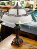 (R3) TABLE LAMP; COMPOSITE TABLE LAMP WITH CARVED FLORAL AND REEDED DETAILING AND A BLACK AND FADED